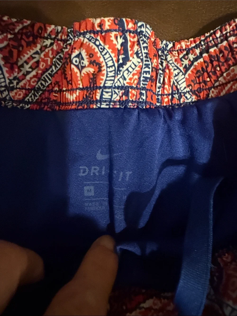 Nike Women's Red Paisley Athletic Shorts with Blue Trim